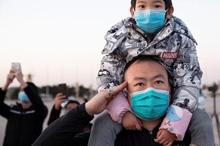China pauses in memory of virus victims and 'martyrs'