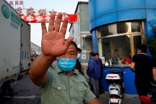 Parts of Beijing locked down due to fresh virus cluster