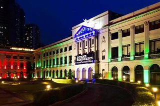 LOOK: La Salle, Letran light up in Kapamilya colors in support of ABS-CBN