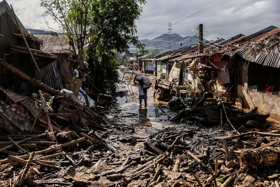 IN PHOTOS: Kasiglahan residents grapple with TY Ulysses impacts; climate emergency declaration pushed 1