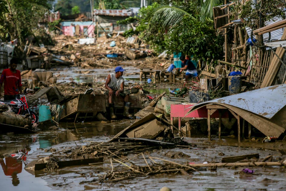 IN PHOTOS: Kasiglahan residents grapple with TY Ulysses impacts; climate emergency declaration pushed 2