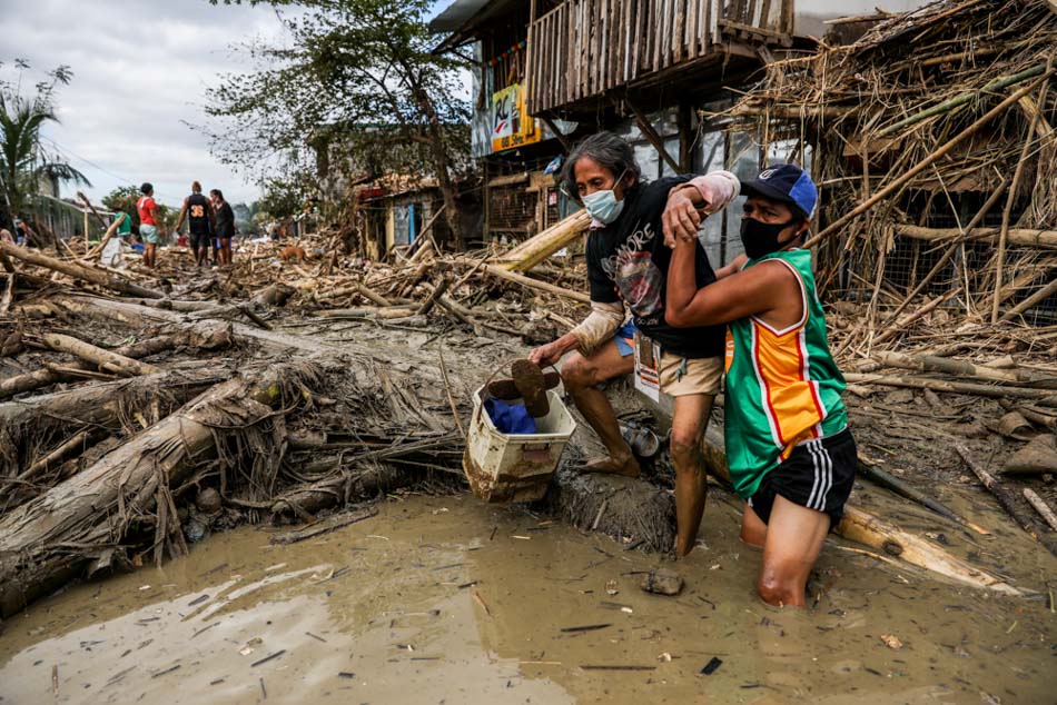 IN PHOTOS: Kasiglahan residents grapple with TY Ulysses impacts; climate emergency declaration pushed 3