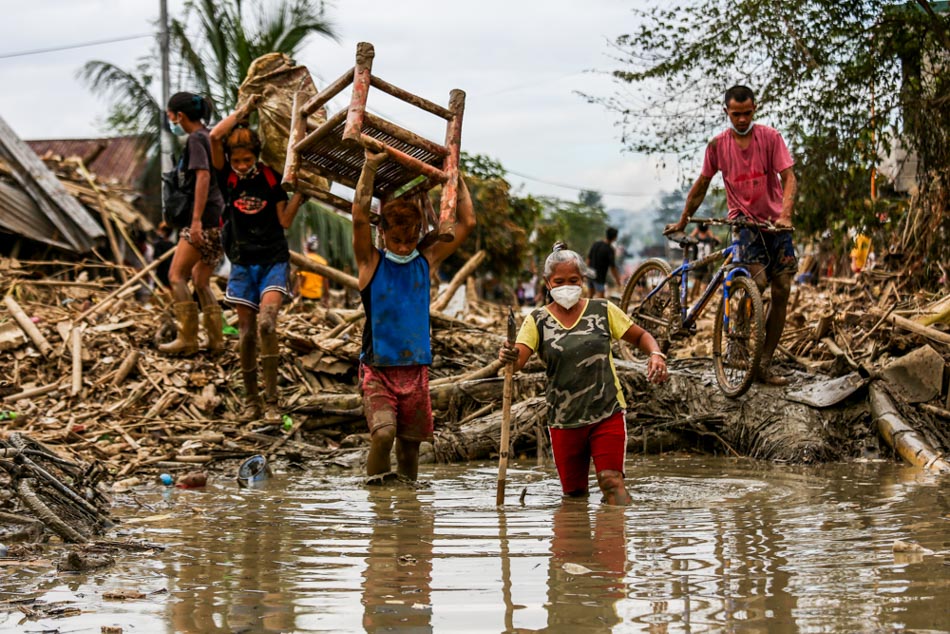 IN PHOTOS: Kasiglahan residents grapple with TY Ulysses impacts; climate emergency declaration pushed 5