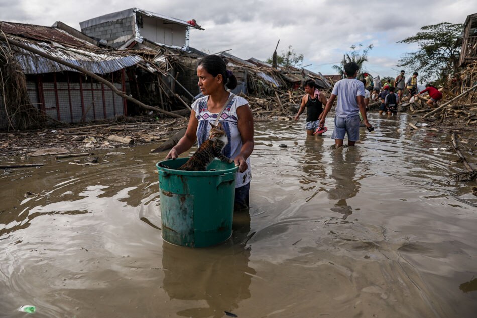 IN PHOTOS: Kasiglahan residents grapple with TY Ulysses impacts; climate emergency declaration pushed 9