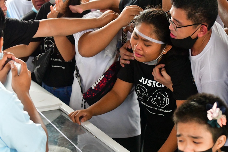 SLIDESHOW: Forgiven, not forgotten: Kin seek justice as slain mother and son laid to rest 14