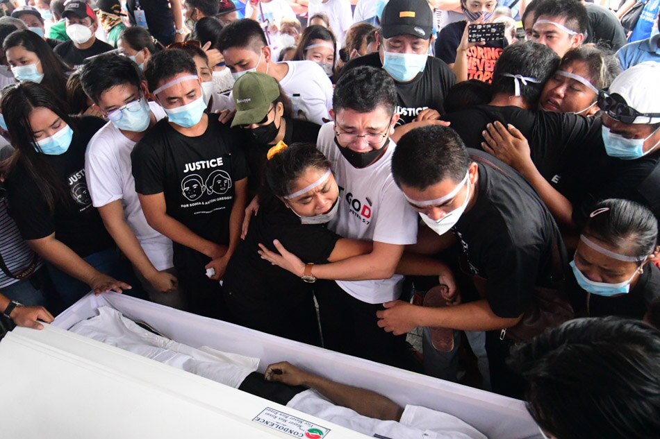 SLIDESHOW: Forgiven, not forgotten: Kin seek justice as slain mother and son laid to rest 15