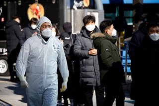 South Korea reports surge in coronavirus cases, more restrictions expected