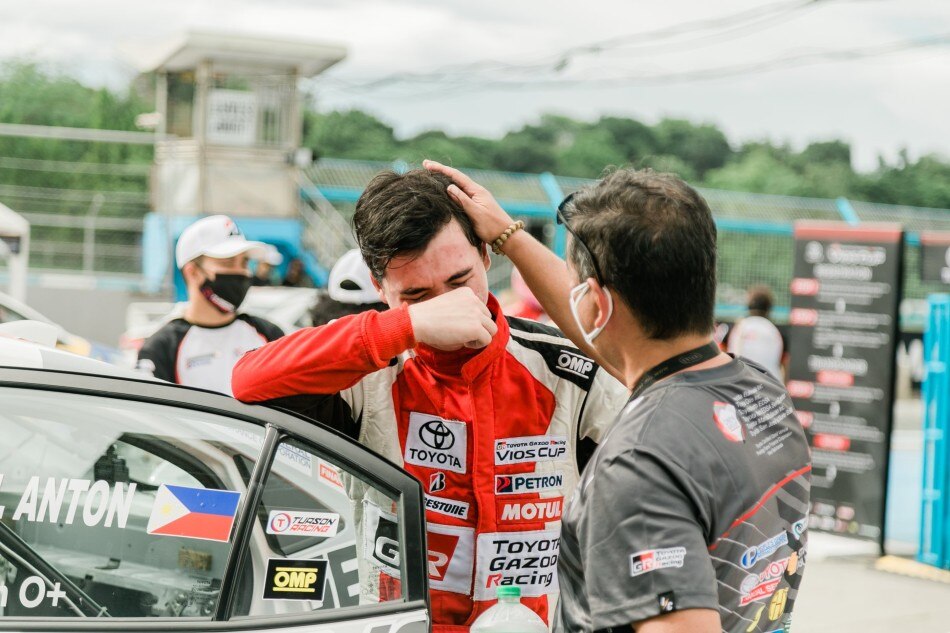 A tearful Iñigo Anton is congratulated by his father, veteran racer Carlos Anton, after cinching a podium finish. Photo source: Toyota Gazoo Facebook Page