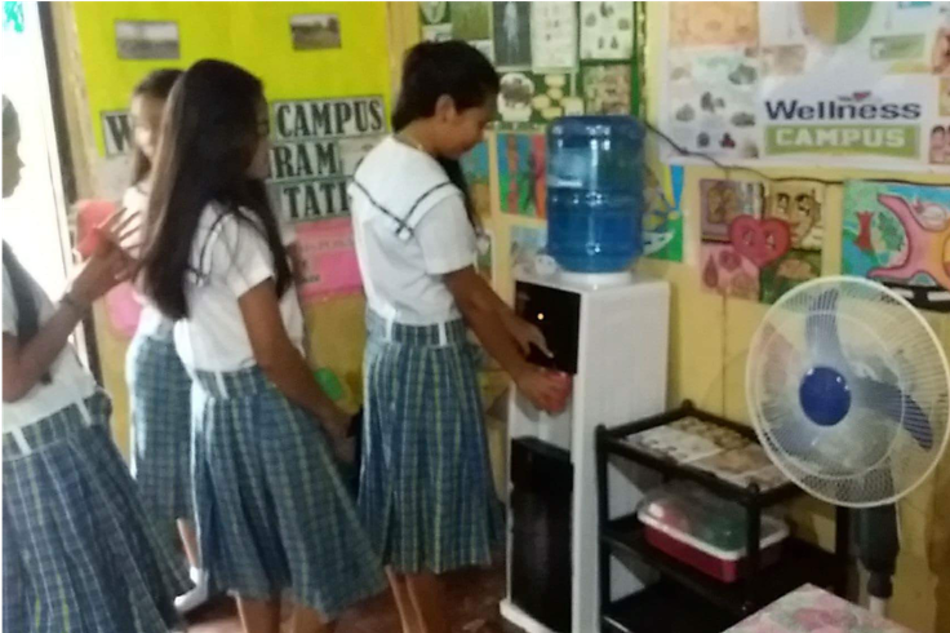 Students from Sta. Maria High School in Iriga now has regular access to clean drinking water. Photo source: Nestlé Wellness Campus