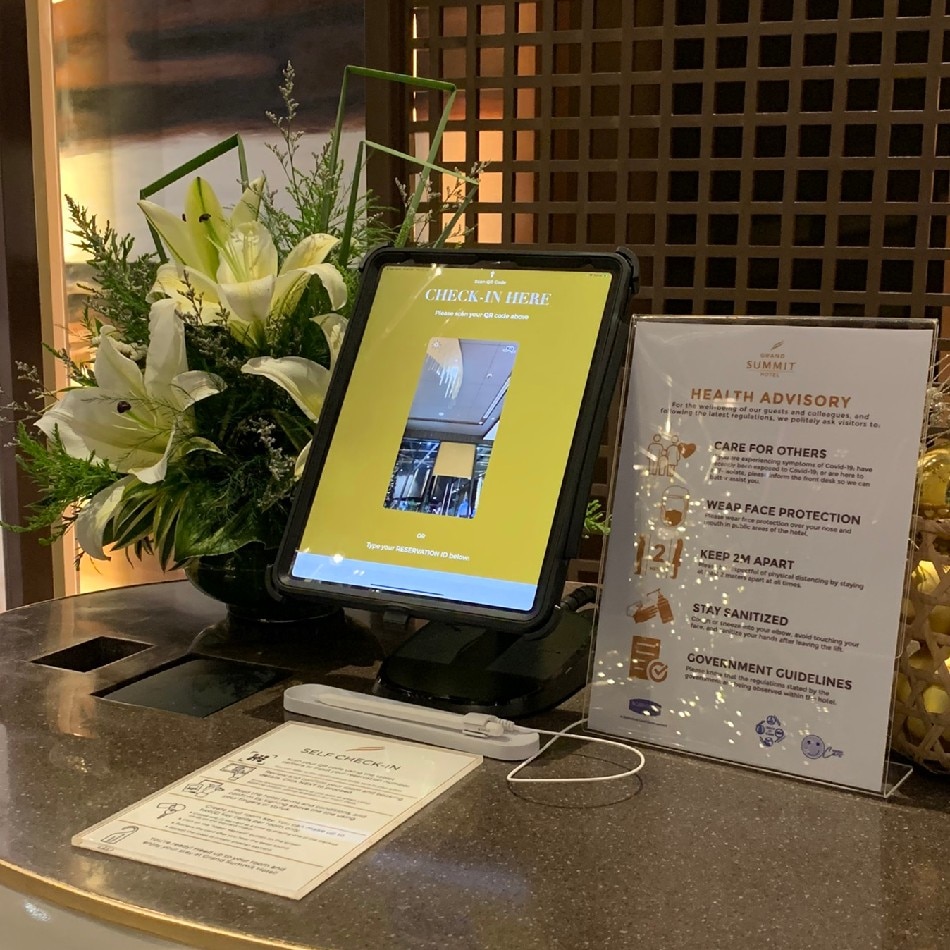 Self Check-In Kiosk at the Front Desk. Photo source: Grand Summit Hotel
