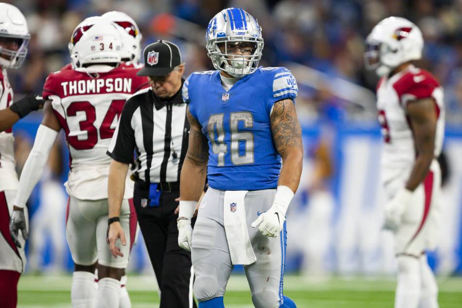 Detroit Lions running back Craig Reynolds (46) walks to the huddle after a play during the fourth quarter against the Arizona Cardinals at Ford Field. Raj Mehta, USA TODAY Sports/Reuters.