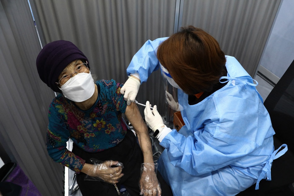 South Korea vaccinates senior citizen after suspension
