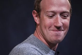 Facebook profit nearly doubles as user ranks grow