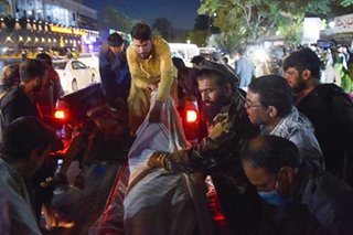 Twin bombings in Kabul airport kill dozens