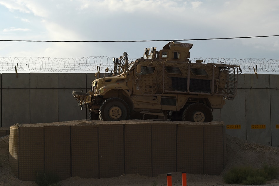 A mine resistant ambush protection vehicle (MRAP) is seen inside the Bagram US air base after all US and NATO troops left, some 70 Kms north of Kabul on July 5, 2021. WAKIL KOHSAR / AFP