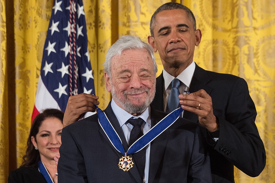 In this file photo taken on November 24, 2015, US President Barack Obama presents the Presidential Medal of Freedom to theater composer and lyricist Stephen Sondheim at the White House in Washington, DC. The legendary Broadway songwriter Stephen Sondheim, widely recognized as having revolutionized American musical theater, died November 26, 2021 at age 91, his lawyer told The New York Times. Nicholas Kamm, AFP