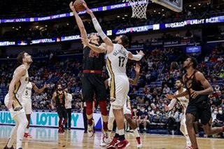 Pelicans dig out of 23-point hole, defeat Cavaliers