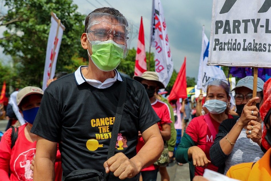 Health workers and supporters under the Bukluran ng Manggagawang Pilipino (BMP), led by their chairman and presidential candidate Ka Leody De Guzman, troop to the Senate in Pasay City on October 28, 2021, to demand a higher budget for the pandemic response. Jonathan Cellona, ABS-CBN News