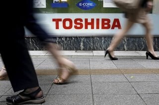 Japan's Toshiba to split into 3 firms