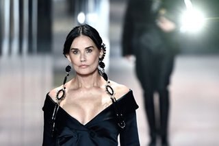 Demi Moore hits the catwalk for Paris Fashion Week