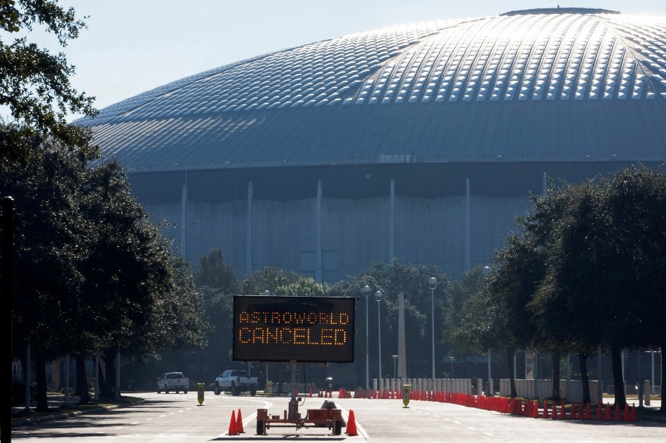 An electronic sign at the entrance to NRG Park states that the Astroworld Festival is cancelled, the morning after a deadly crush of fans during a performance by rapper Travis Scott in Houston, Texas, US November 6, 2021. Daniel Kramer, Reuters