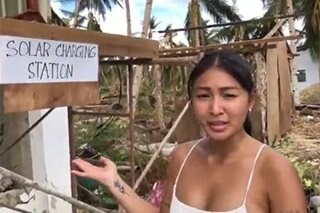 Nadine helps set up solar stations for people in Siargao