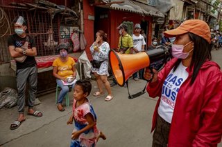 IN PHOTOS: How one woman lined up for hours to get 'ECQ ayuda'