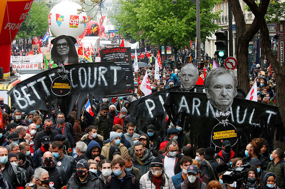 Arrests in Paris as thousands join May Day protests across France ABS