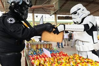 LOOK: 'Stormtroopers' share goods in community pantry in Cebu