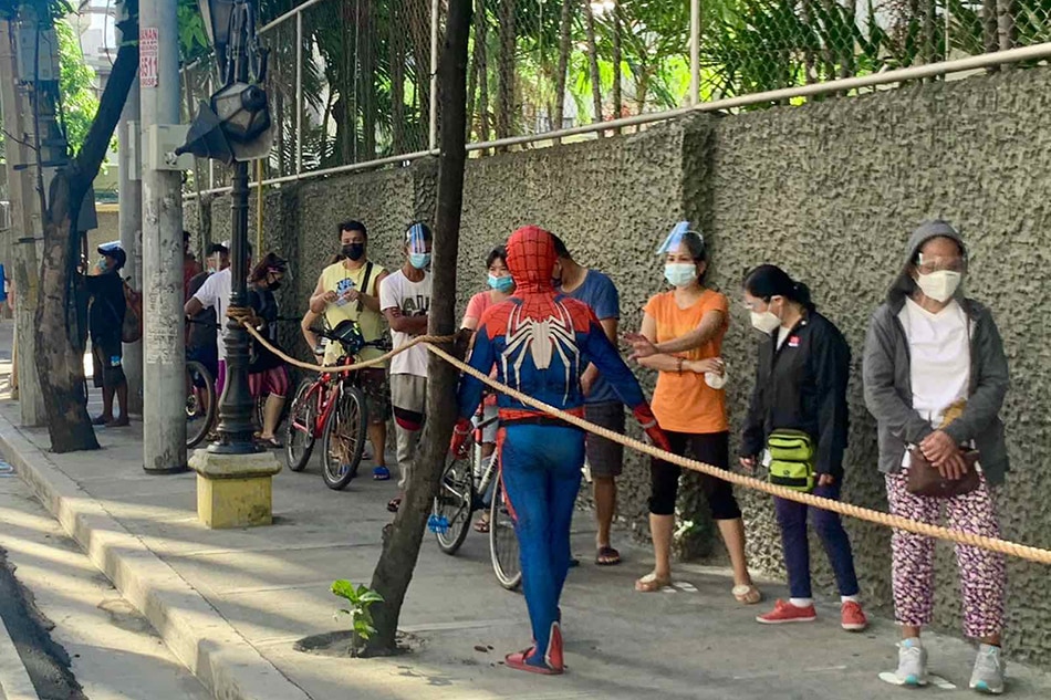 LOOK: Friendly barangay Spider-Man helps out in &quot;kindness station&quot; 1