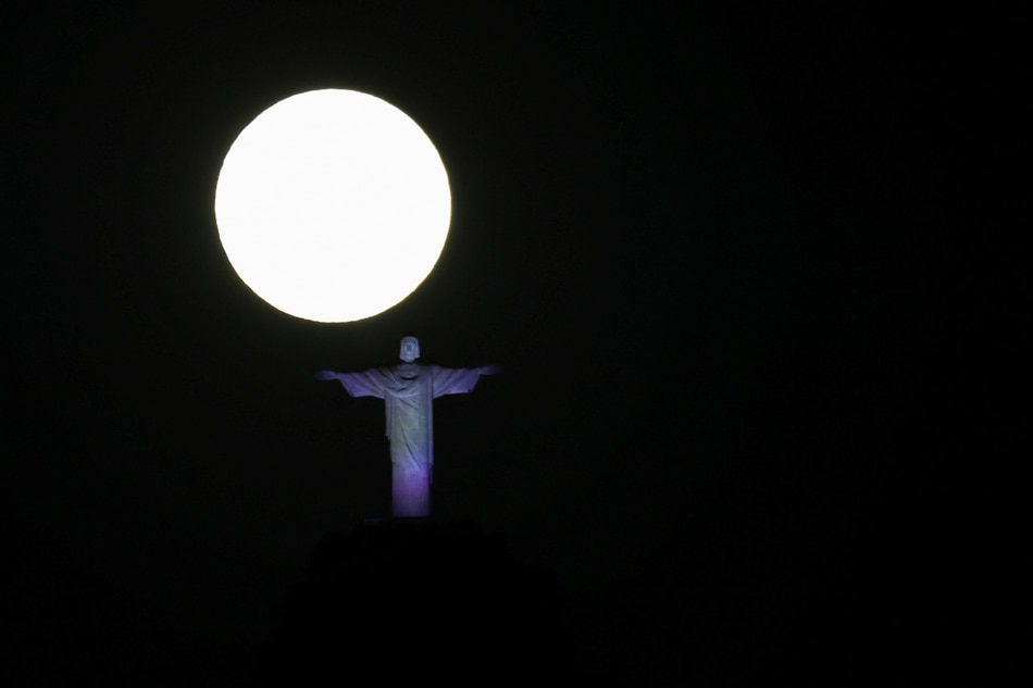 Supermoon shines bright over Christ the Redeemer