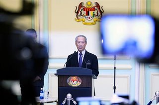 Malaysia Prime Minister defies calls to quit