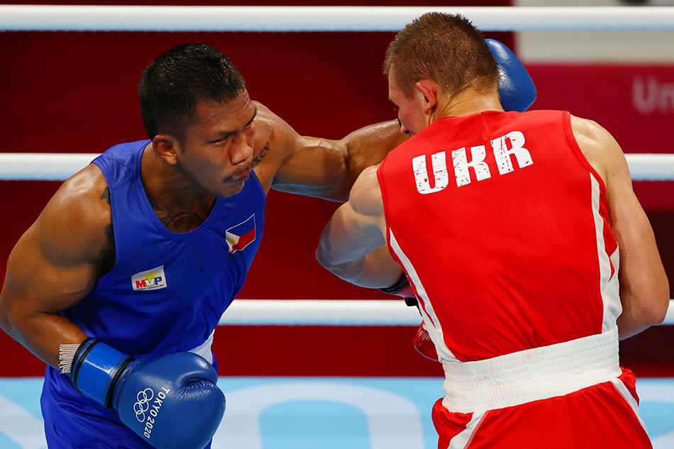 Eumir Marcial of the Philippines in action against Oleksandr Khyzhniak of Ukraine REUTERS/Amr Abdallah Dalsh