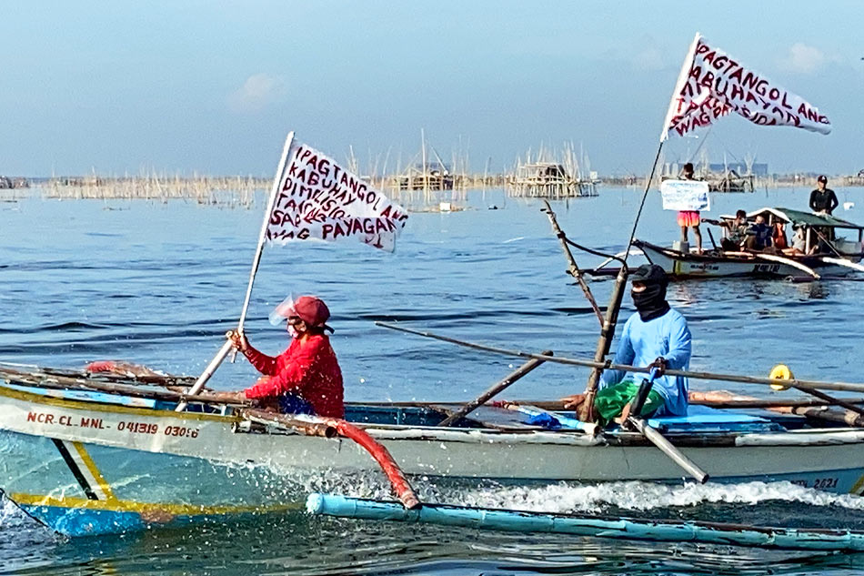 Fishermen from La Huerta, Parañaque hold a fluvial protest at their fish pens & mussel farms in Manila Bay to show their opposition to the government's planned dismantling of so-called illegal fishing structures, set to begin in Cavite on Tuesday. Anjo Bagaoisan, ABS-CBN News