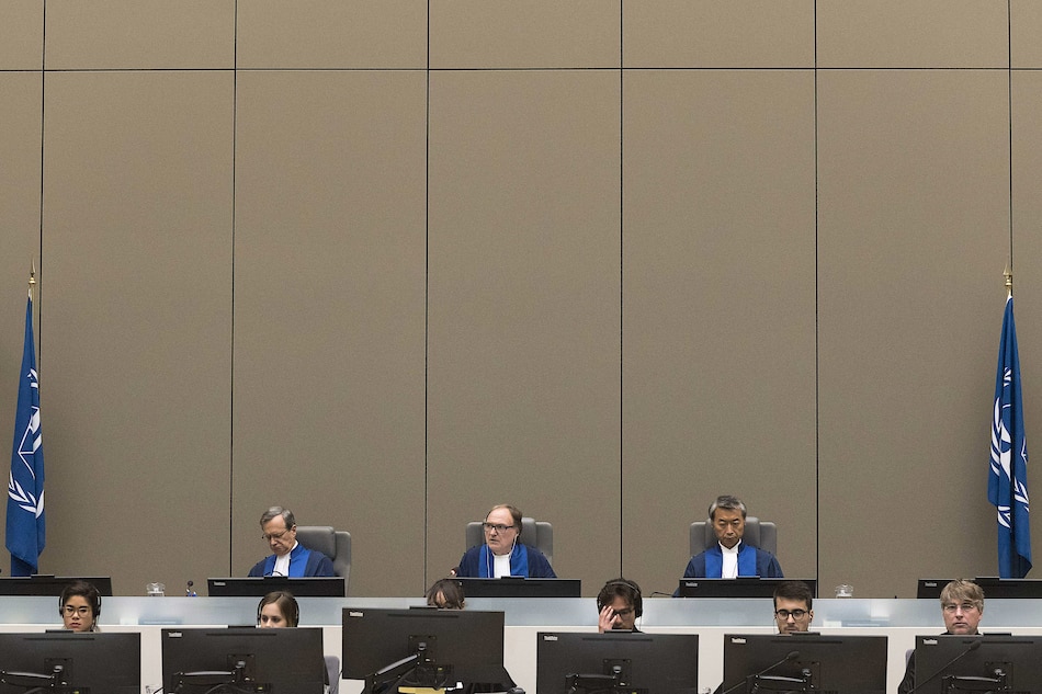 Judges make a decision in a case at the International Criminal Court (ICC) in The Hague on July 6, 2017. AFP Photo/Pool/Evert Elzinga