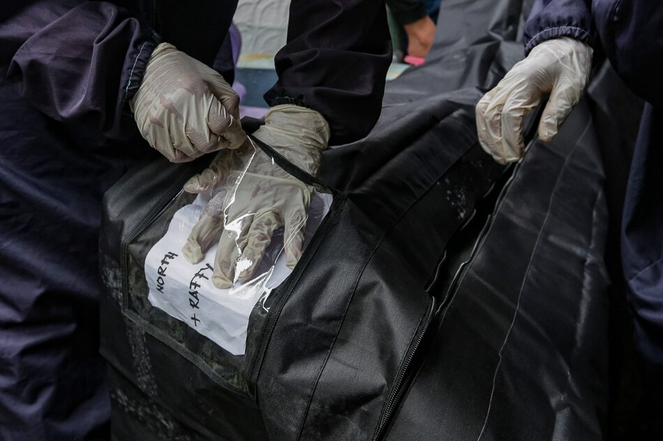 IN PHOTOS: Alleged EJK victims exhumed as graves&#39; lease expires 10