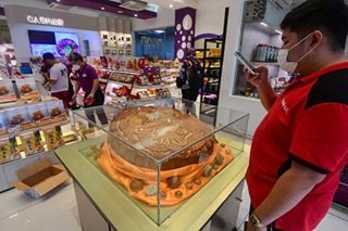 Buying mooncakes for Mid-Autumn Festival