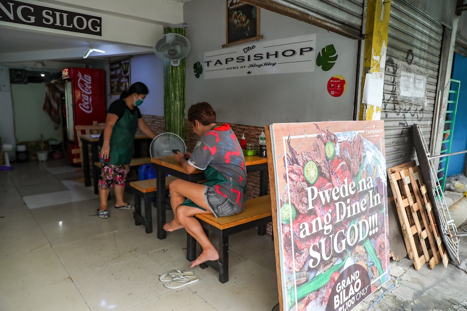 Small restaurants prepare to accept limited dine-in customers in Manila on September 30, 2021. Jonathan Cellona, ABS-CBN News/File
