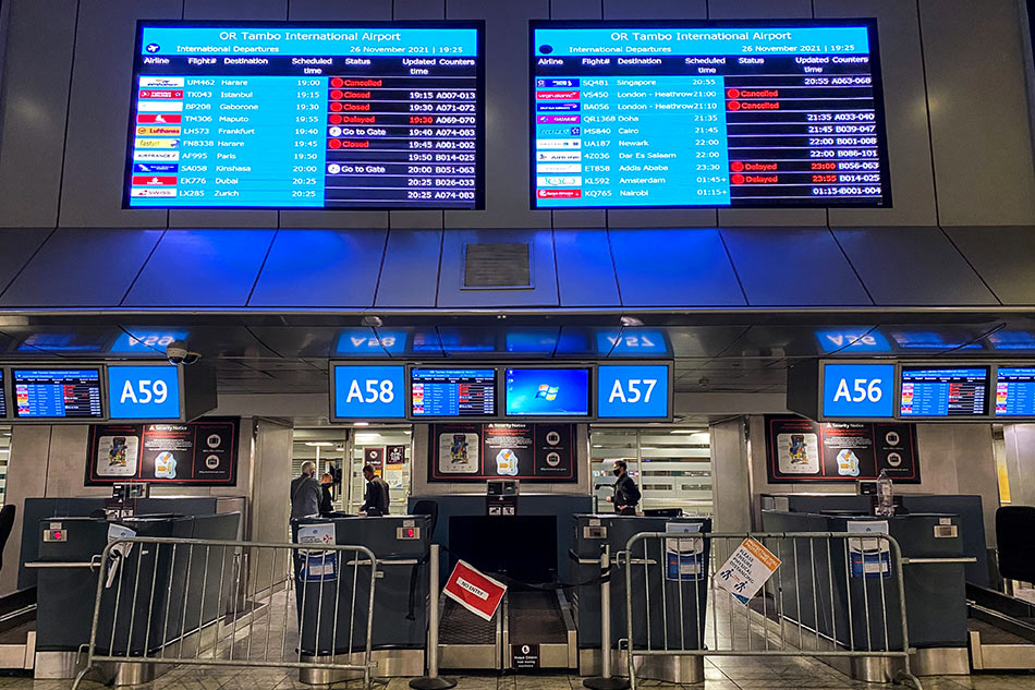 Digital display boards show cancelled flights via Sumaya Hisham, Reuters