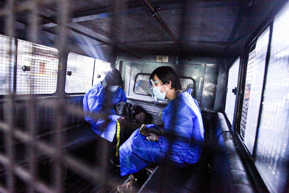 Bureau of Jail Management and Penology officers transport Pharmally Pharmaceutical Corp. executives Mohit Dargani and Linconn Ong on December 3, 2021. Senate PRIB handout/file