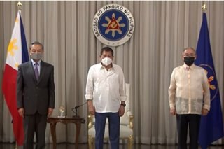 LOOK: Duterte meets with Chinese Foreign Minister Wang Yi at Malacañang