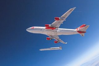 Branson's Virgin Orbit reaches space for first time
