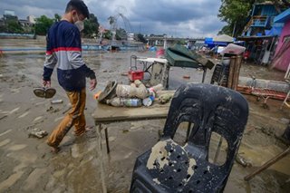 Cleaning up after the flood in Marikina