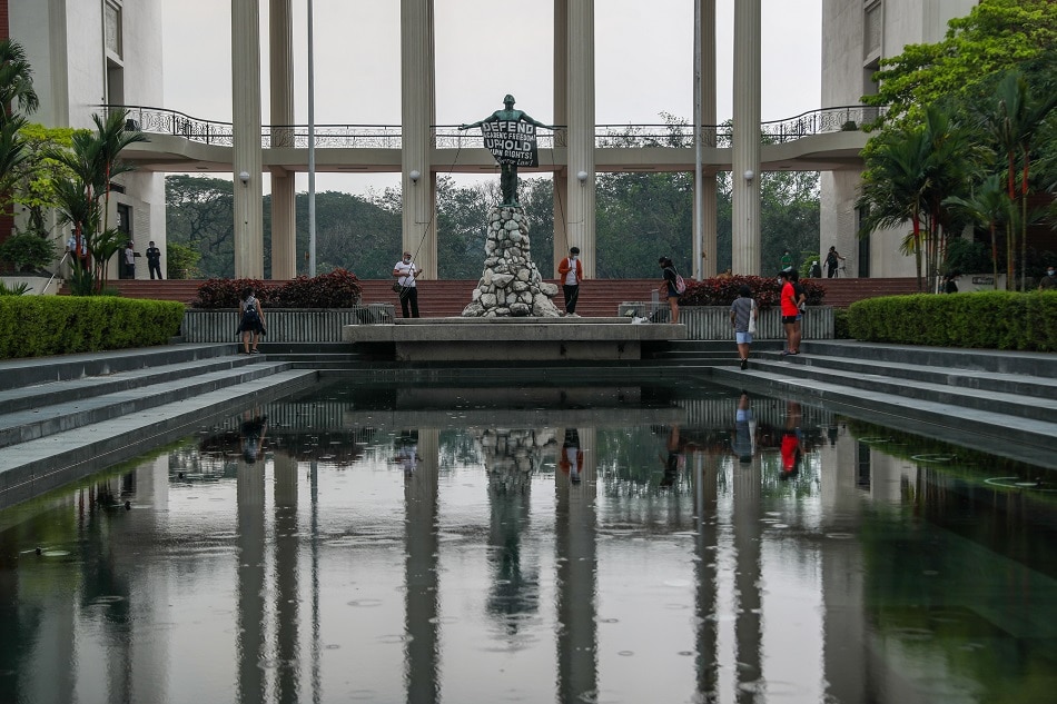 Students and professors hold a symbolic protest at the University of the Philippines-Oblation Plaza in UP Diliman, Quezon City on January 26, 2021. Jonathan Cellona, ABS-CBN News
