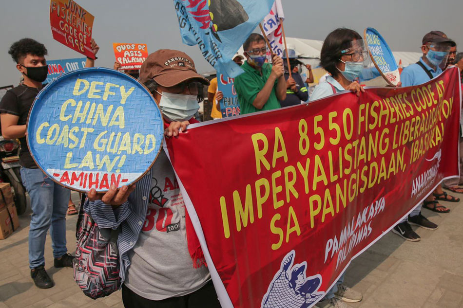 Filipino fishermen protest Chinese Coast Guard law ABSCBN News