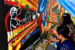 TINGNAN: Kampanya kontra terorismo idinaan sa murals sa Camarines Sur