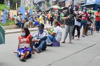 Batasan Hills residents wait for ECQ aid