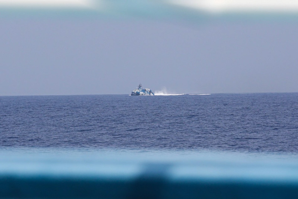 LOOK: Chinese vessels hound Philippine fishing boat 3