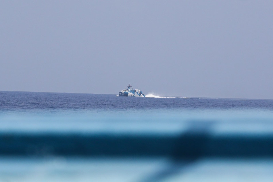 LOOK: Chinese vessels hound Philippine fishing boat 4