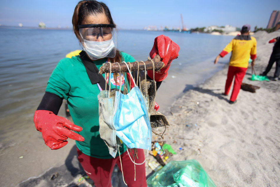 Disposable face masks among trash collected from Manila Bay